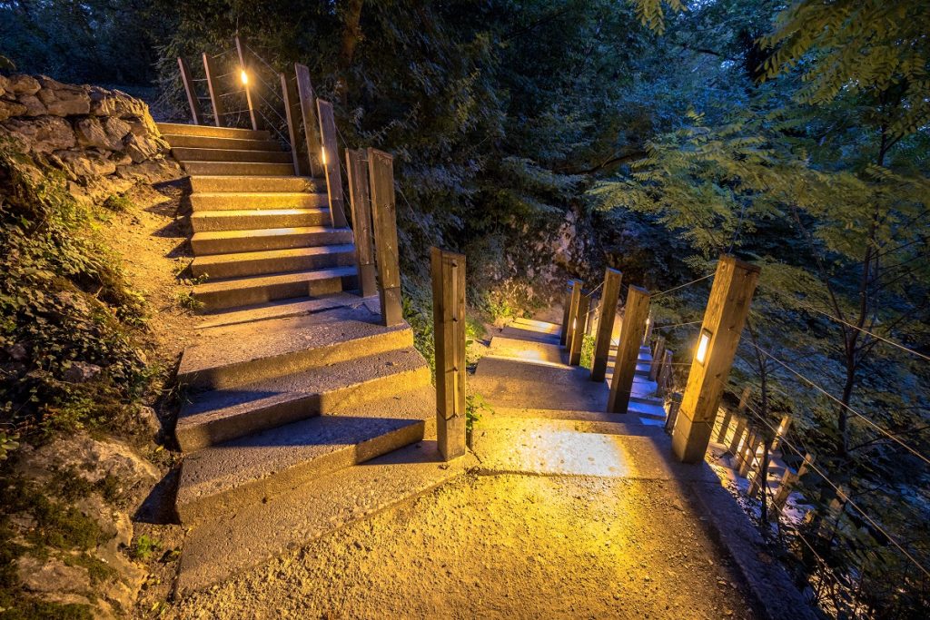 Outdoor stairway lit by low step lights
